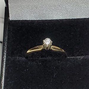 Diamond solitaire ring.